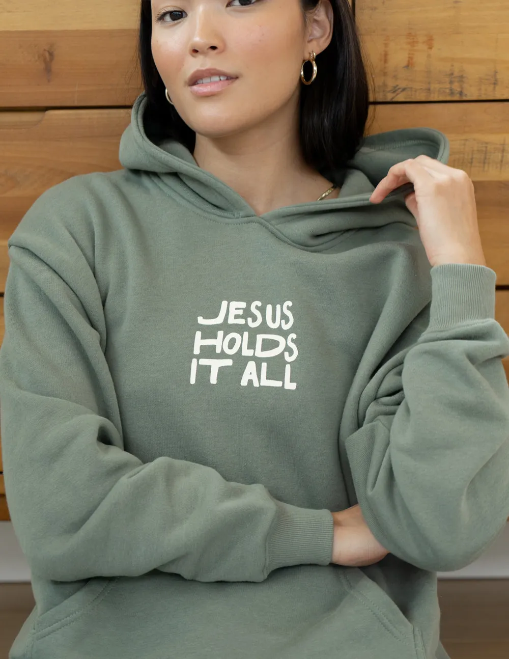 Jesus Holds It All Unisex Hoodie